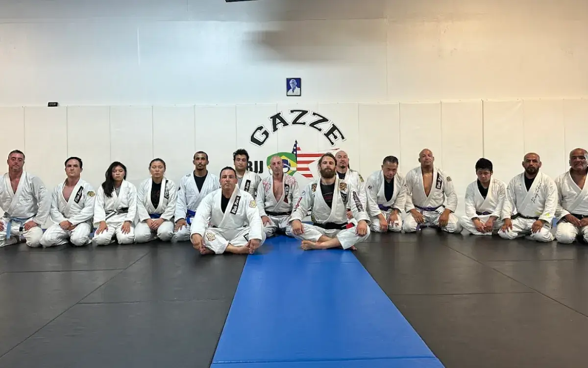 Paulo and his students lined up in white gis at Gazze Academy