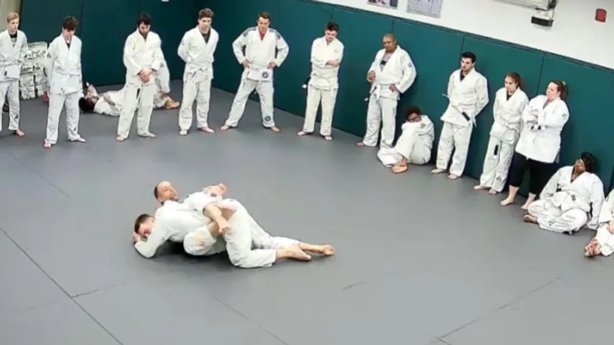 The adult class at Gracie Jiu Jitsu St. Nicolas, after