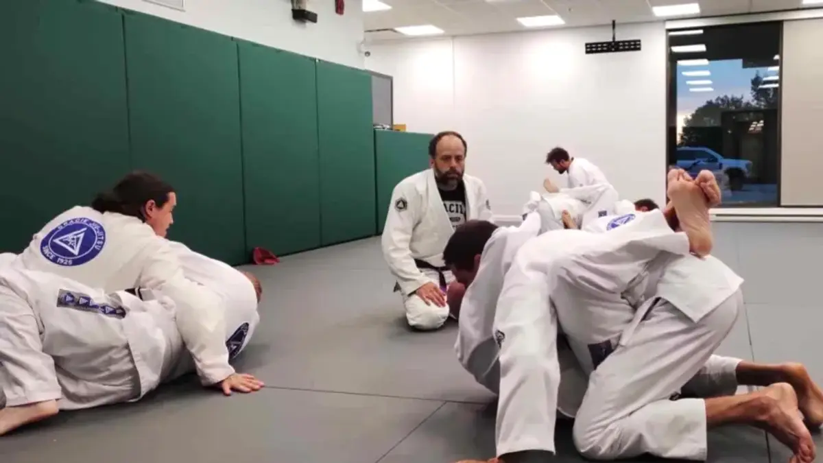 The adult class at Gracie Jiu Jitsu St. Nicolas, before